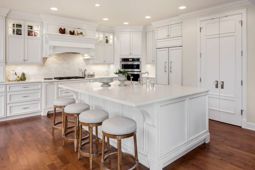 Traditional luxury kitchen with island and stools