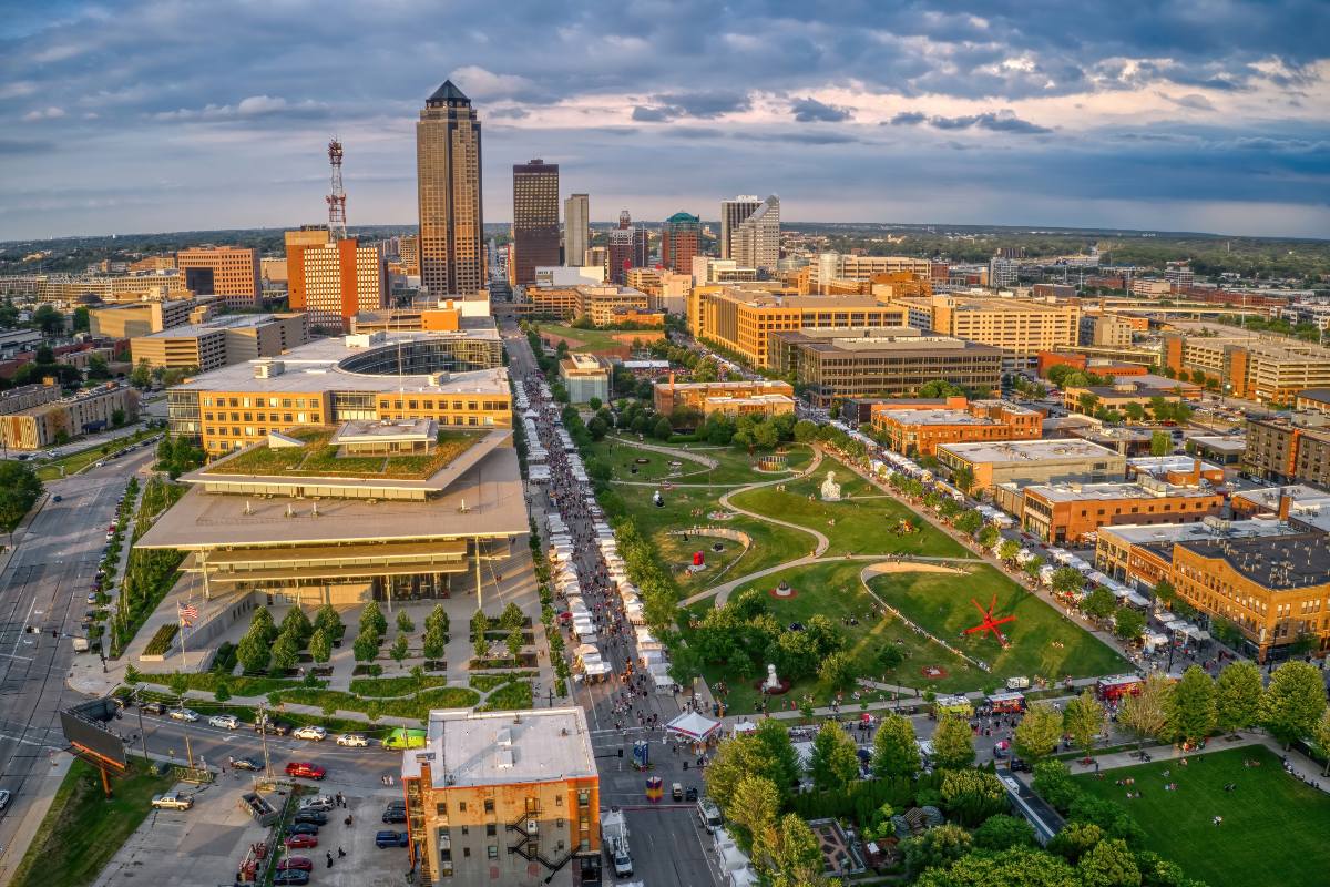 An aerial view of monks, by a partially cloudy day. You can see the Pappajohn sculpture park in the foreground. 