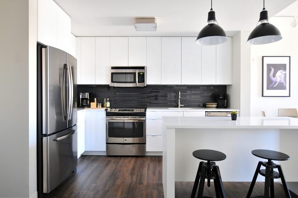 Kitchen with bar stools on the island