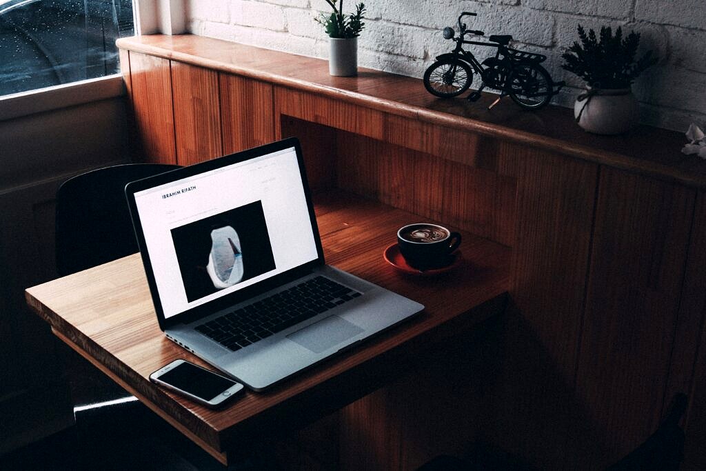 laptop on a drop table