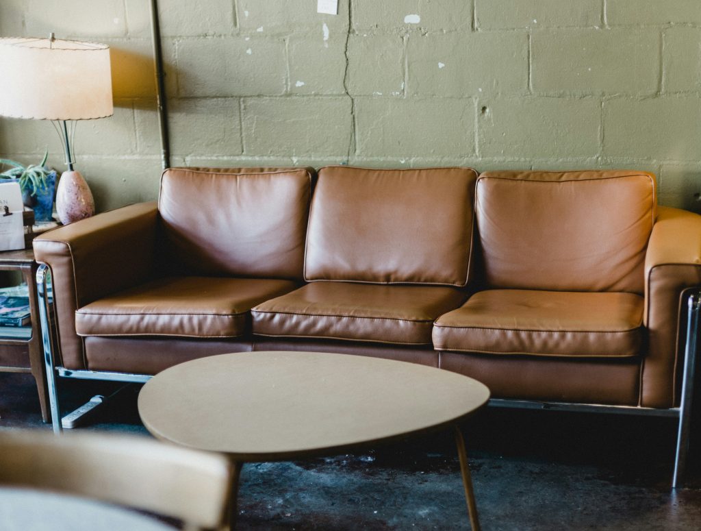 Living room configuration with leather sofa